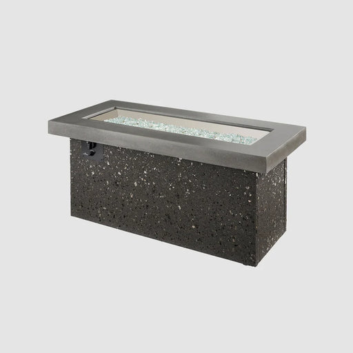 The Fire Pit Table unlit, highlighting its shape and concrete top.