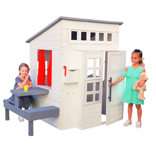 Kids playing around the Outdoor playhouse