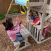 Kids playing on the wooden playset for kids