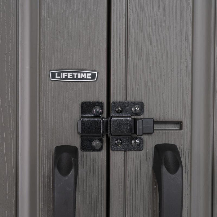 Close-up of the locking mechanism on the gray doors of the Lifetime 8 ft x 5 ft Outdoor Storage Shed.