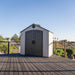 Lifetime 8 ft x 5 ft Outdoor Storage Shed situated on a wooden deck, illustrating the shed's outdoor compatibility.
