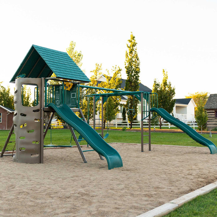 The Lifetime 91080 Swing Set fully assembled and showcased in an outdoor setting at dusk.