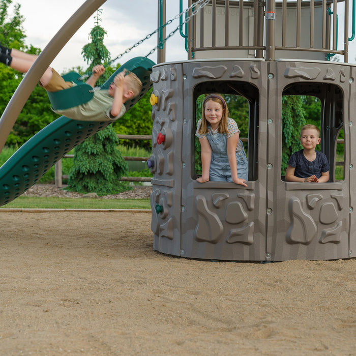 Children swinging and hanging from the trapeze bar on the Lifetime Adventure Tower Playset, SKU 91200.