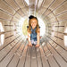 A smiling girl crawling through the tunnel bridge of the Lifetime Adventure Tunnel Playset.
