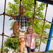 Children navigating the brown rope cargo net on the Lifetime Big Stuff Deluxe Swing Set 91087.