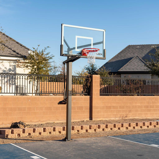 Full court view of the Lifetime Mammoth Bolt Down 60-Inch Basketball Hoop installed on a home basketball court.