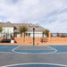 Full basketball court view with the Lifetime Mammoth Basketball Hoop installed.