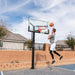 Player making a jump shot at the Lifetime Mammoth Basketball Hoop.