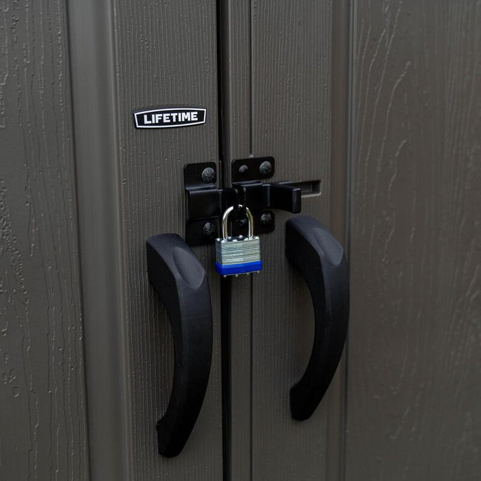 Close-up of the lock and handle on the doors of the Lifetime 10 x 8 ft. Outdoor Storage Shed.