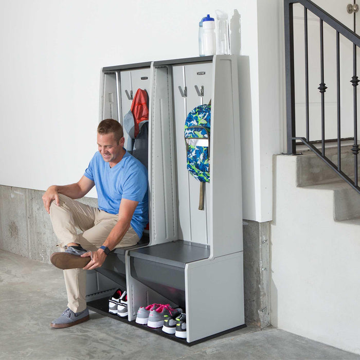 Front view of grey Lifetime storage lockers with bench seating