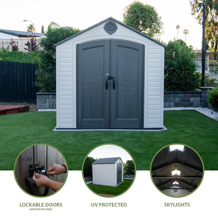 Lifetime 8 ft x 7.5 ft Outdoor Storage Shed showcasing lockable doors, UV protection, and skylights, set in a landscaped yard.