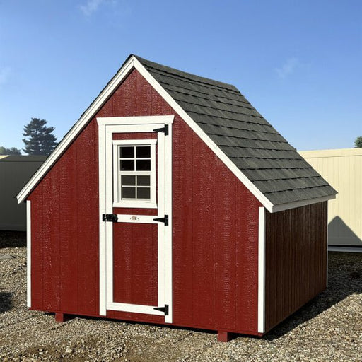 Red A-frame coop from Little Cottage Company seen from the front angle.