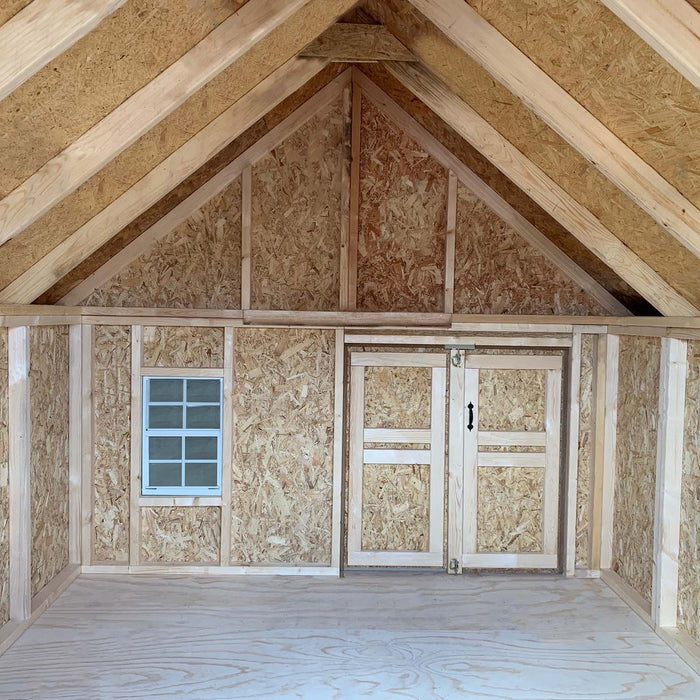 Interior of The Firehouse Playhouse by Little Cottage Company, showing the walls and roof