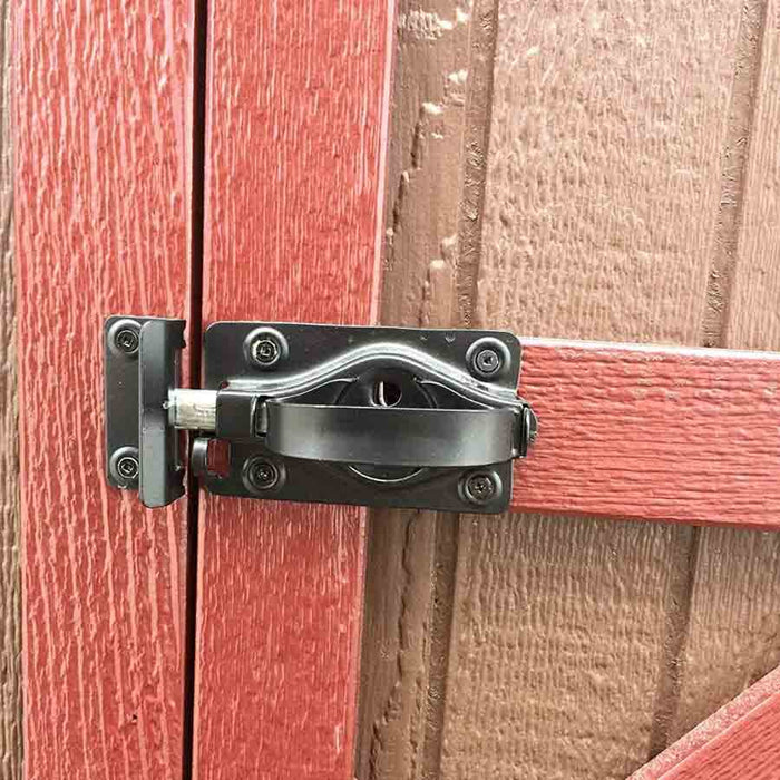 The secure lock system of the Craftsman Playhouse with Slide by Little Cottage Company, ensuring safety and peace of mind during playtime