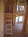 Ladder leading to the loft inside Little Cottage Company Sara's Victorian Mansion Playhouse.