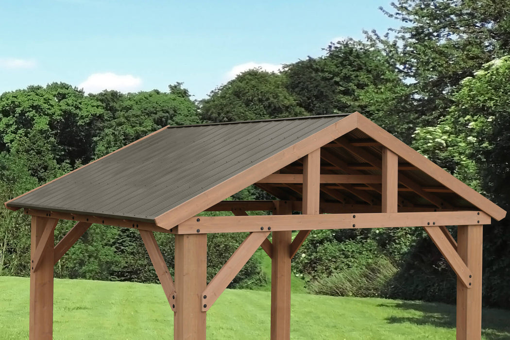 Side view showing the aluminum roof and the strong wooden framework of the 14x12 Yardistry Meridian Pavilion.