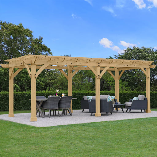 Fully assembled YM11932 10x22 Pergola in a garden setting with outdoor furniture under its shelter.
