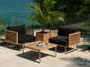 Monterey Furniture set displayed in an outdoor setting with ocean backdrop