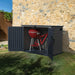 Duramax vinyl storage shed with double doors open, revealing a grill and bicycle stored inside. Ideal for organizing outdoor spaces and protecting belongings from the elements. 