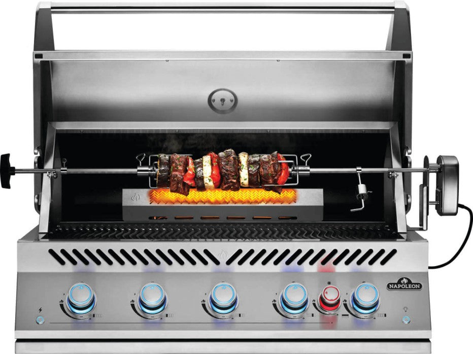 The Napoleon Grills Built-In 700 Series 38-Inch RB 6-Burner Gas Grill Head in use, featuring a rotisserie with skewered meats and vegetables, showcasing the grill's versatility and large cooking surface.