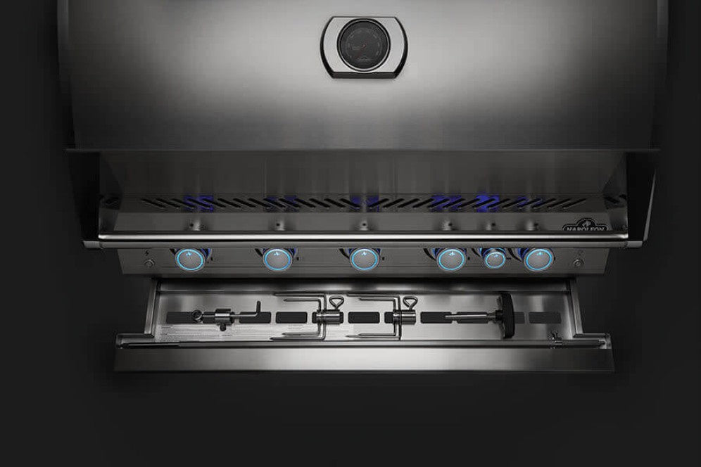 An image showcasing the integrated storage for the rotisserie kit in the Napoleon Grills Built-In 700 Series, emphasizing convenience and organization.