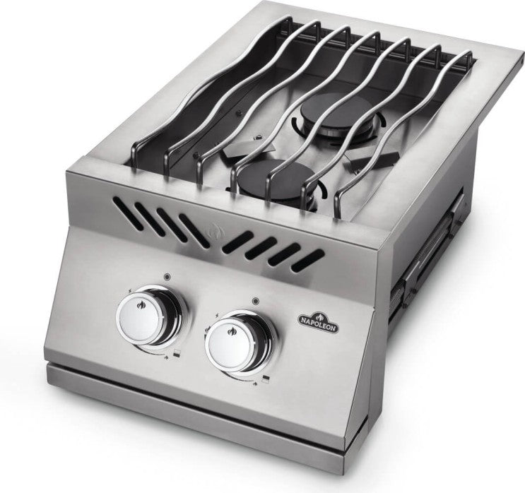 Angled view of Napoleon Grills Built-In 500 Series 10-inch single range top burner showing the grate and control knobs.