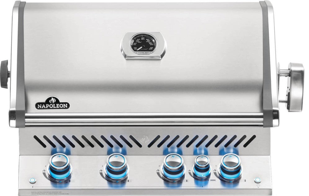 Front view of Napoleon Grills Built-In Prestige PRO™ 500 RB without the rotisserie, featuring illuminated control knobs and a closed lid with temperature gauge.