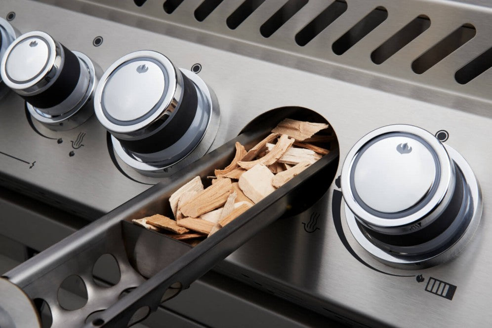 Image showing the wood chip smoker tray and control knobs of the Napoleon Grills Built-In Prestige PRO™ 665 RB.