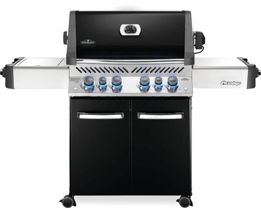 Front view of the Napoleon Grills Prestige® 500 RSIB 6-Burner Grill in black with the lid closed and illuminated control knobs.