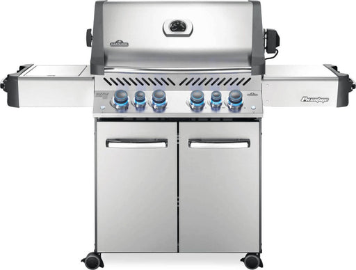 Front view of the Napoleon Grills Prestige® 500 RSIB 6-Burner Grill in stainless steel with illuminated control knobs and a closed lid.