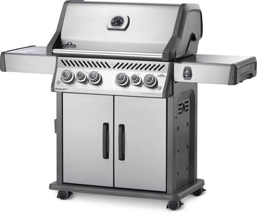Angled view of the Napoleon Grills Rogue SE 525 RSIB Grill showing the stainless steel finish and control knobs in the on position.