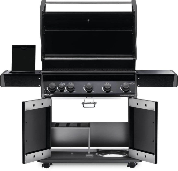 The Napoleon Grills Rogue XT 625 SIB Grill with its lid open, side burner visible, and storage cabinet doors open, showcasing its interior components and storage.