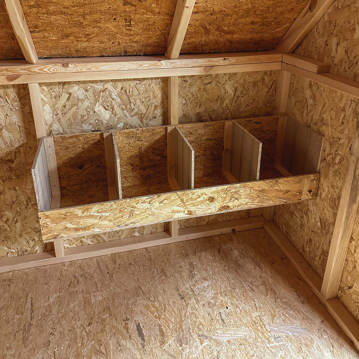 Interior view of nesting boxes with roof detail. of the Value A-Frame Coop by Little Cottage Company.
