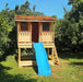 front view of Cozy Cabin Playhouse & Sandbox 7x9