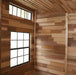 Inside the Outdoor Living Today Studio 12x8, the spacious interior boasts a varied wood paneling design