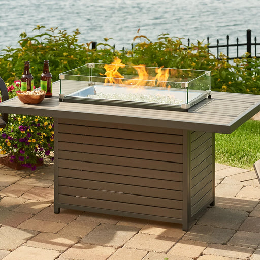 The Outdoor Greatroom Co Brooks Rectangular Gas Fire Pit Table set in a beautiful outdoor scene with a vibrant flame, perfect for gatherings, SKU BRK-1224-19-K.