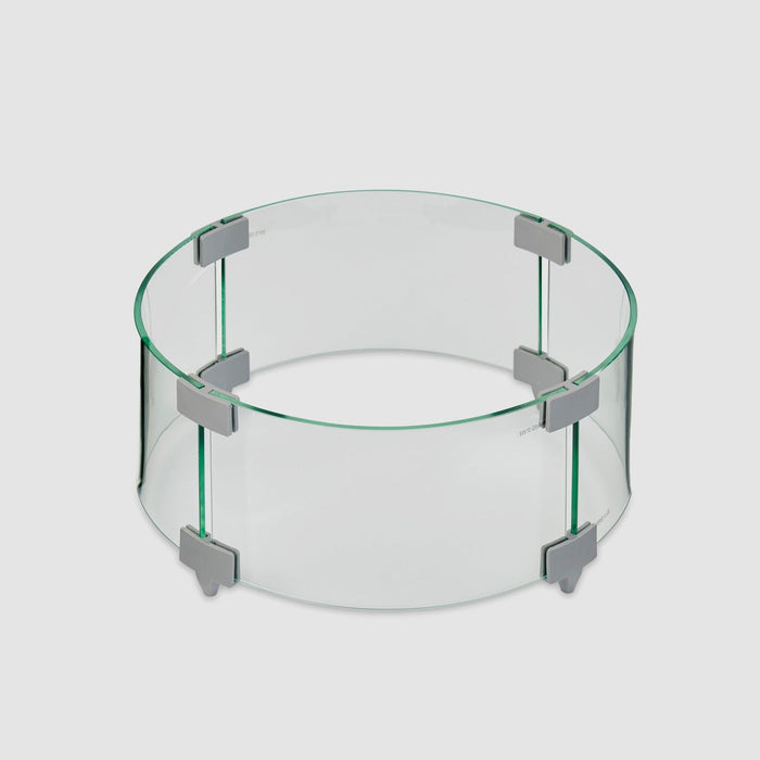 A 12-inch round glass wind guard showcasing new clip designs on a white background.