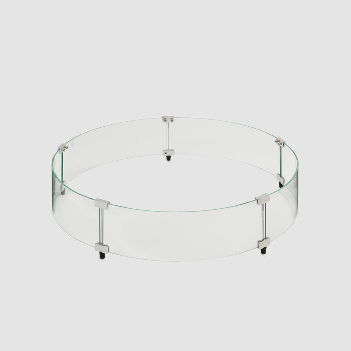 A 30-inch round glass wind guard for outdoor use displayed on a white backdrop.