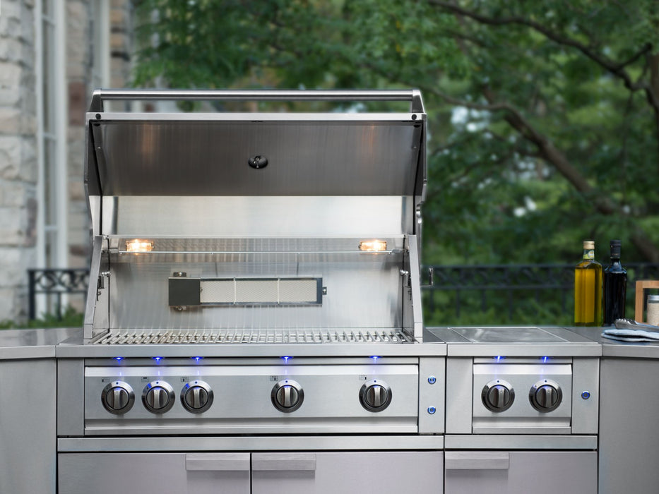 Outdoor Kitchen Stainless Steel	Grill in backyard setting