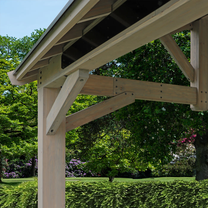 Detailed view of the wooden support beams and aluminum roof of the 16x14 Timber Frame Yardistry Pavilion.