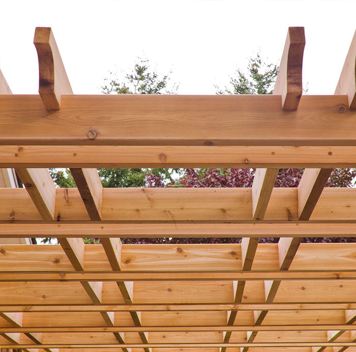 A close-up view showcasing the intricate details of the Outdoor Living Today Pergola's wooden structure.