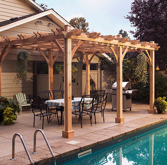Outdoor Living Today Pergola with Retractable Canopy 12×20 enhancing poolside dining experience.