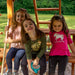 Girls on the picnic table of the Swing Set