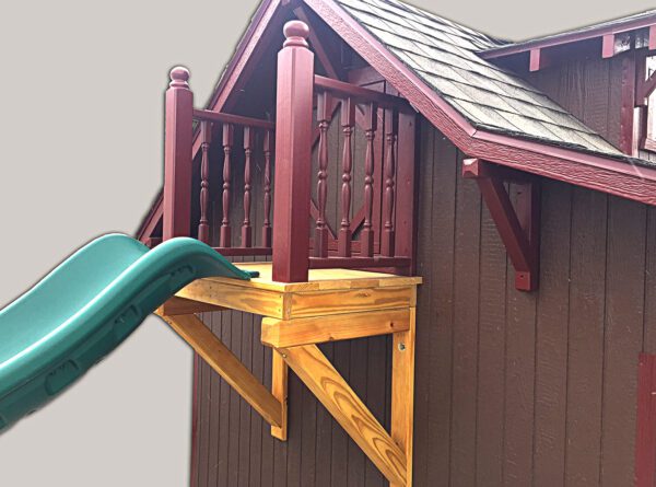 The sturdy platform of the exhilarating slide in the Craftsman Playhouse by Little Cottage Company, providing a safe launching point for adventurous fun