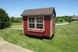 EZ-Fit portable chicken coop kit in a countryside setting, featuring a 5x8 structure with a wide window and ramp access.