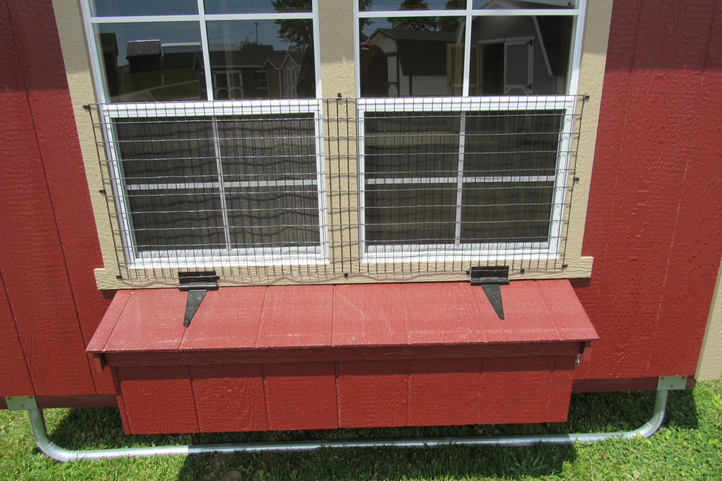 Durable wire mesh window protection on a 5x8 EZ-Fit portable chicken coop, ensuring safety and airflow.