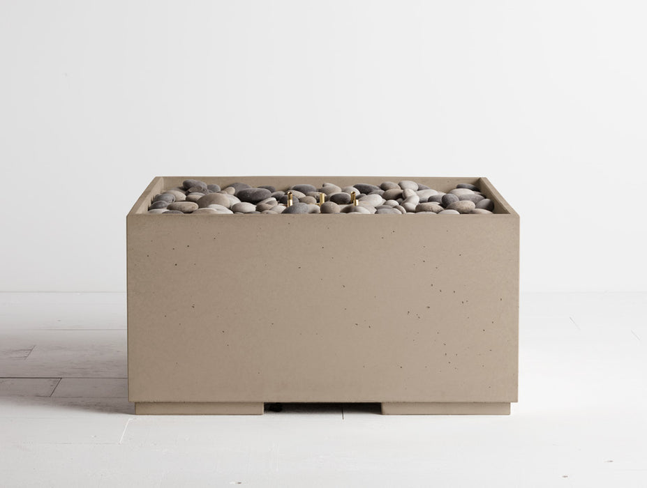 Portobello muted grey Solus Decor Firebox 30, a statement piece for terraces with its sharp geometric form and pebble adornments.