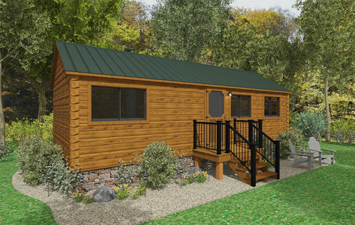 Nestled amidst lush trees and greenery, the Ranger Cabin from Oasis Tiny Estates features a charming small wooden design with a green metal roof. A set of four black railing steps leads up to the entry door, and two outdoor chairs are conveniently placed to the right.