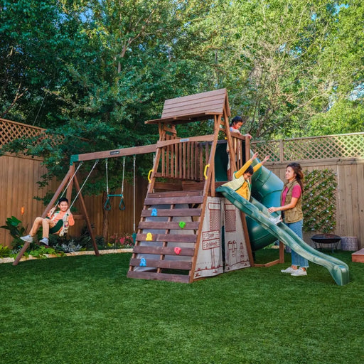 Outdoor Ranger Retreat Swing Set in the backyard with people