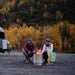 Couple using the Solo Stove Ranger Fire Pit with Stand 2.0 outdoors.